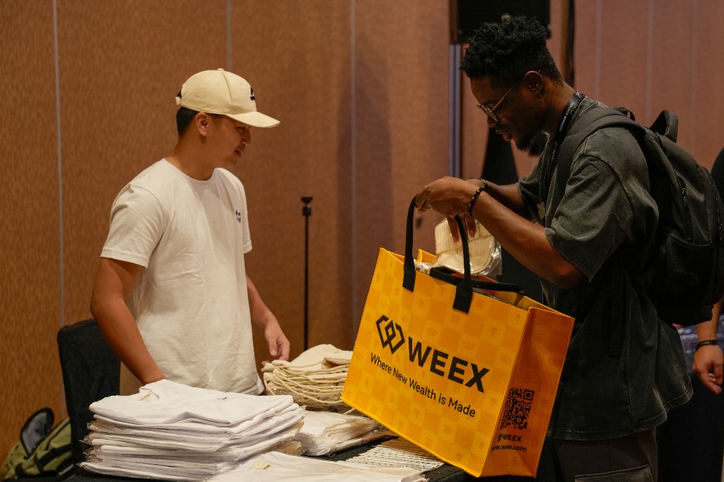 Token2049 attendee swag handover